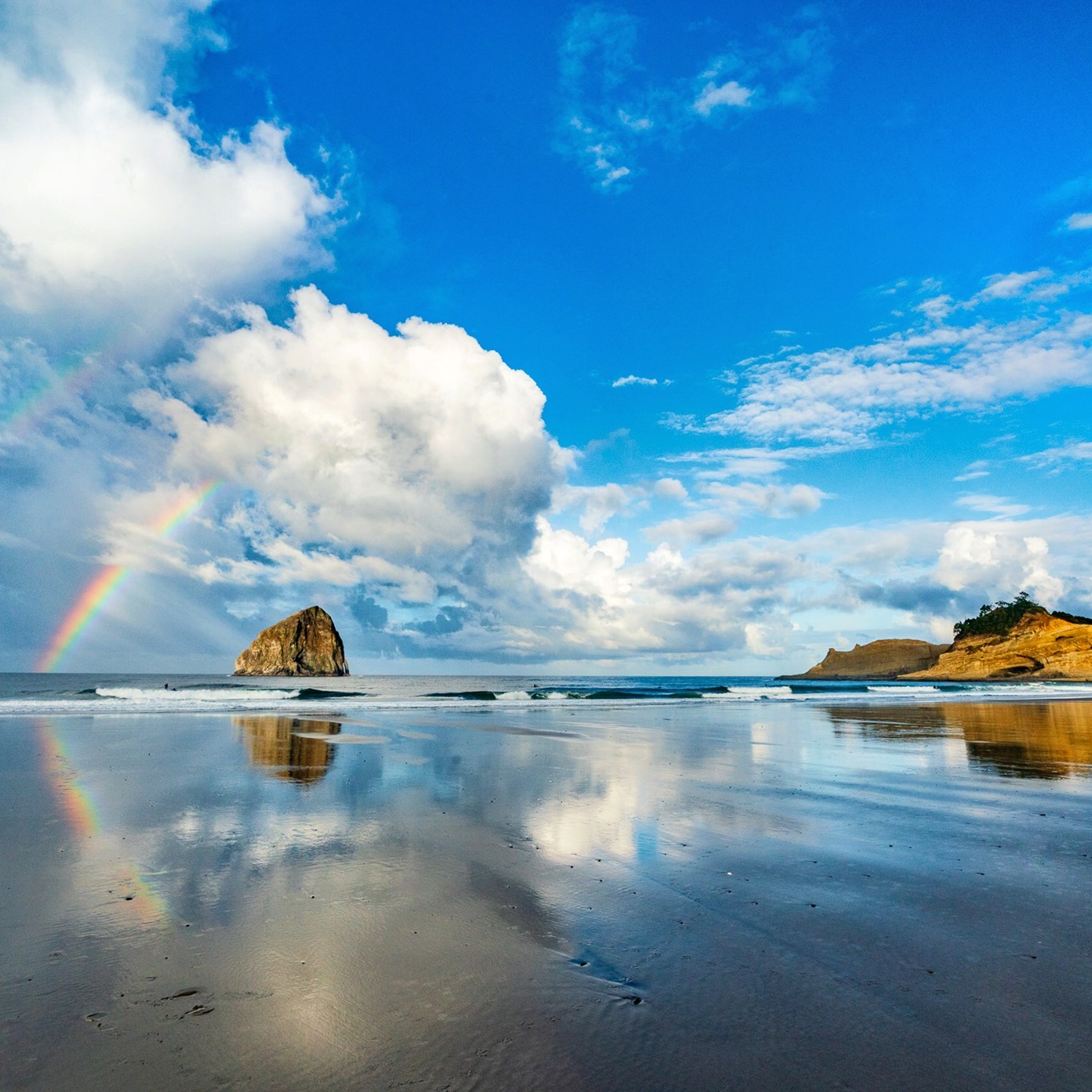 Pacific City Beach with a rainbow